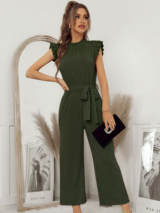 A model wearing the Sophia Women's Ruffled Jumpsuit featuring stylish ruffled sleeves, a high neckline, and a flattering tie-waist design, paired with wide-leg pants, showcasing an elegant and versatile outfit suitable for various occasions.