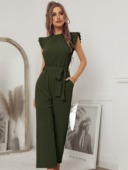 A model wearing the Sophia Women's Ruffled Jumpsuit featuring stylish ruffled sleeves, a high neckline, and a flattering tie-waist design, paired with wide-leg pants, showcasing an elegant and versatile outfit suitable for various occasions.
