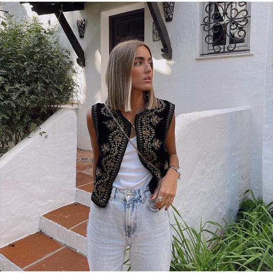 Sleeveless women's vest featuring intricate embellishments and bohemian-inspired detailing, adding a touch of elegance and unique style to any outfit.