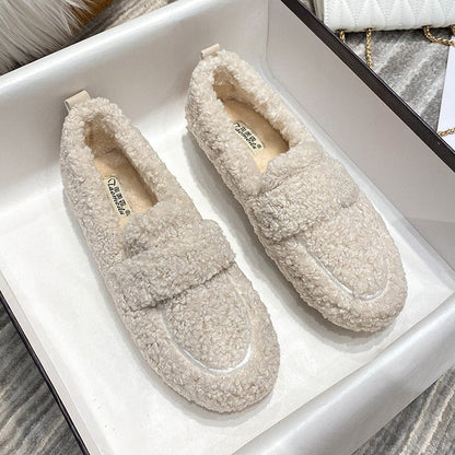 Plush slip-on women's shoes with a cozy and soft design, offering ultimate comfort and style for casual outings or indoor wear.