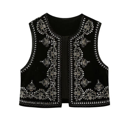 Sleeveless women's vest featuring intricate embellishments and bohemian-inspired detailing, adding a touch of elegance and unique style to any outfit.