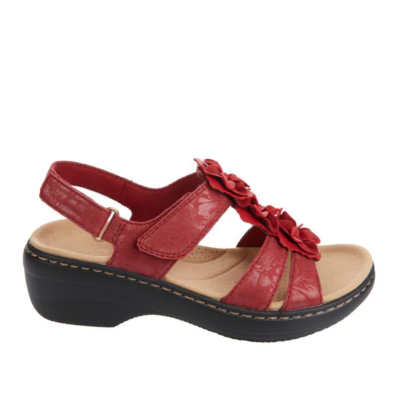 Image showing women's floral sandals with stylish strap design and floral embellishments, offering a comfortable wedge sole for casual wear.