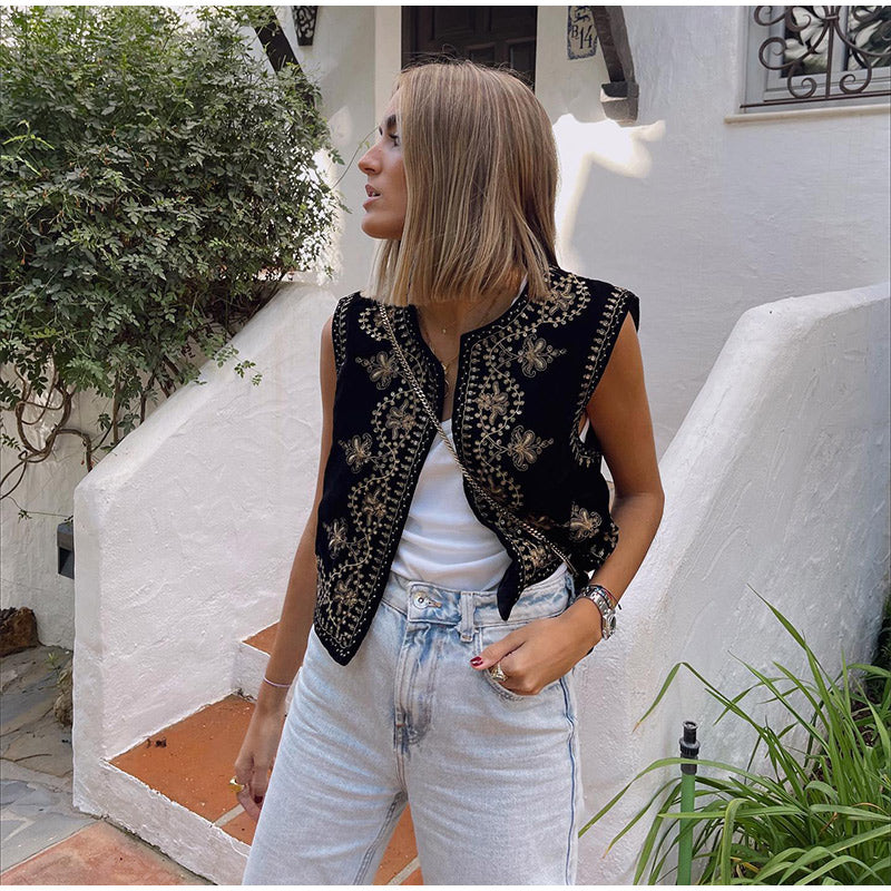 Sleeveless women's vest featuring intricate embellishments and bohemian-inspired detailing, adding a touch of elegance and unique style to any outfit.