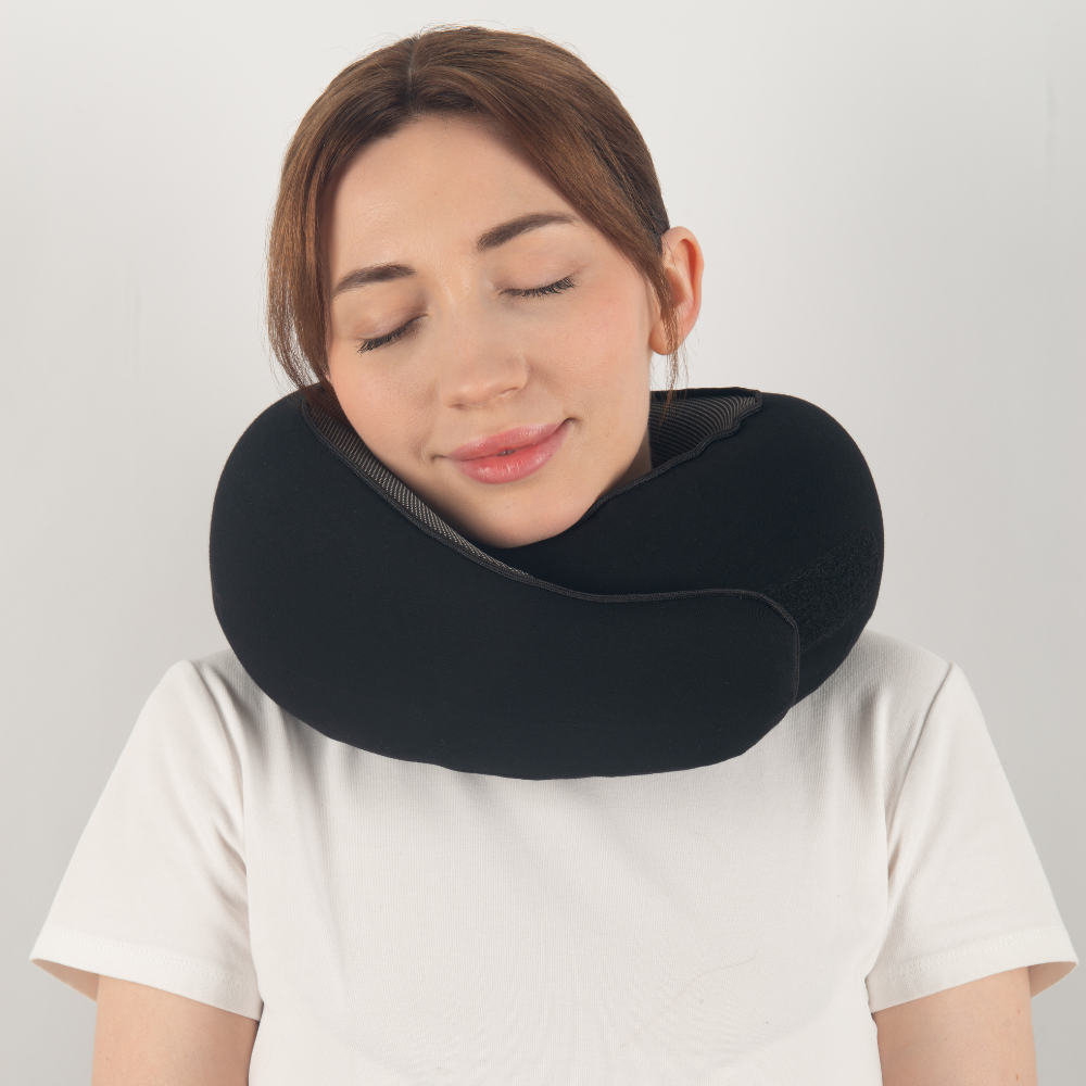 Ergonomic travel pillow designed for neck and head support, offering ultimate comfort during long trips. Compact, lightweight, and perfect for flights, car rides, or relaxing at home. Ideal for reducing strain and ensuring restful travel.