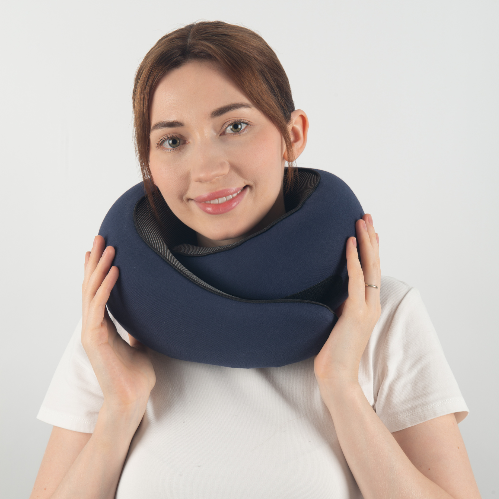 Ergonomic travel pillow designed for neck and head support, offering ultimate comfort during long trips. Compact, lightweight, and perfect for flights, car rides, or relaxing at home. Ideal for reducing strain and ensuring restful travel.