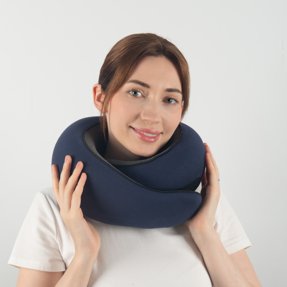 Ergonomic travel pillow designed for neck and head support, offering ultimate comfort during long trips. Compact, lightweight, and perfect for flights, car rides, or relaxing at home. Ideal for reducing strain and ensuring restful travel.