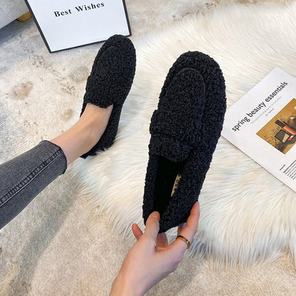 Plush slip-on women's shoes with a cozy and soft design, offering ultimate comfort and style for casual outings or indoor wear.