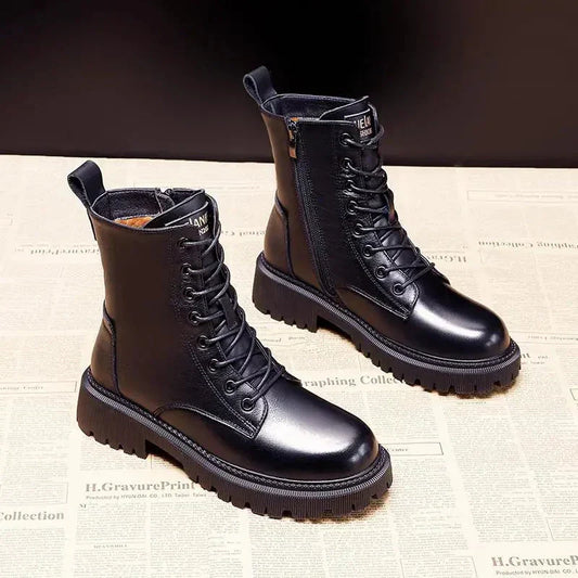 Pair of boots featuring a warm and cozy interior lining with a durable and stylish design, perfect for cold weather and outdoor activities.