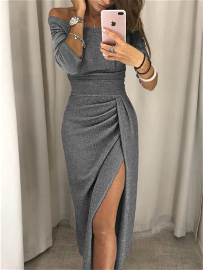 Woman wearing the Bella Women's Off-Shoulder Ruched Dress, a stylish party dress featuring a ruched waist, off-shoulder neckline, and an elegant side slit, posing in front of a mirror while holding a phone.