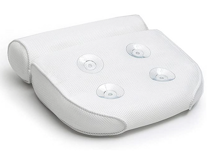 Bath pillow with ergonomic design featuring a cushioned headrest and padded back support, placed on a bathtub for enhanced comfort and relaxation.