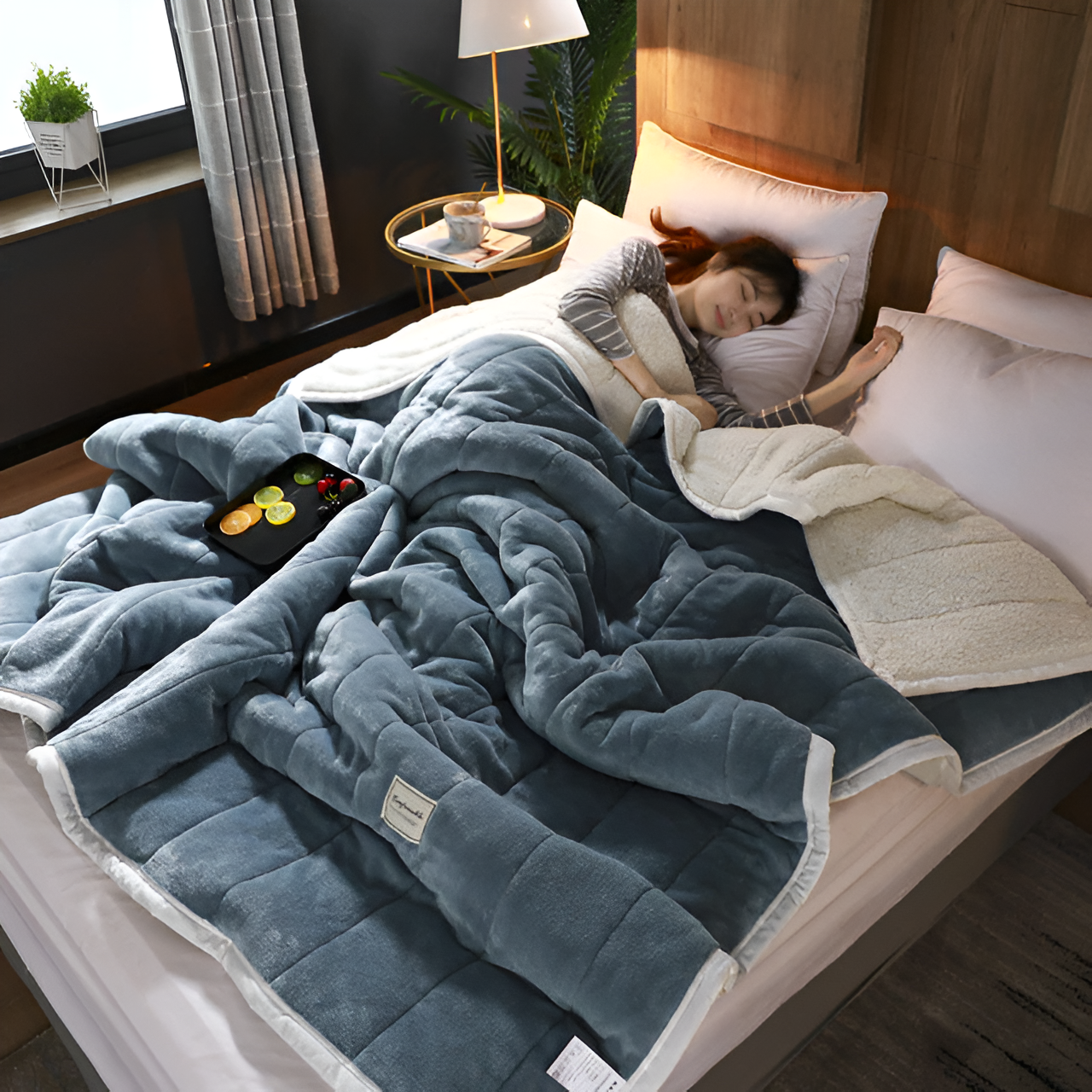 Plush bedding set featuring a cozy blanket and pillows, creating a luxurious and comfortable sleeping environment, shown in a serene bedroom setting with a person peacefully resting.