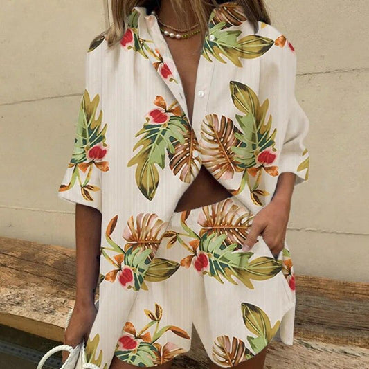 Stylish women's outfit set featuring a button-up top with an elegant leaf pattern and matching shorts, designed for a relaxed and fashionable fit, perfect for casual and summer wear.