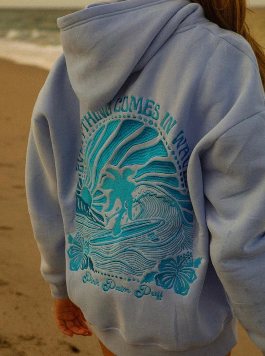 Back view of a woman wearing the Luna Women's Graphic Hoodie, showcasing a detailed graphic design with a relaxed fit, perfect for casual and cozy wear.