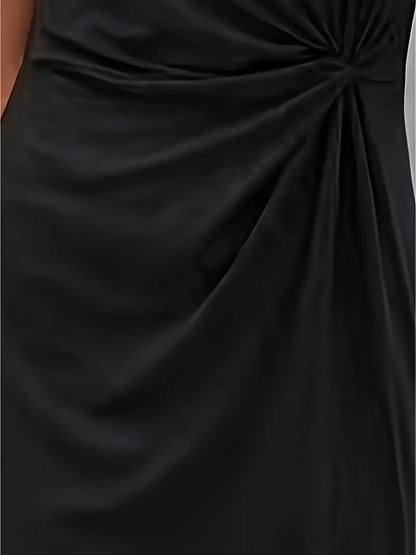 A woman wearing an elegant dress with a flattering ruched design, perfect for both casual outings and formal events. The dress highlights a sophisticated and stylish silhouette, paired with a clutch for a polished look.