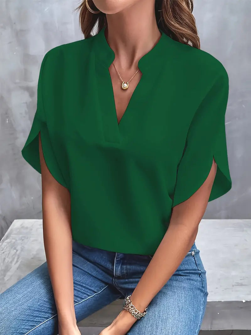 Image showing a woman wearing the Clara Women's Stylish Top, featuring a sleek and elegant design with a flattering neckline, paired with jeans for a chic and versatile look.