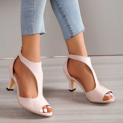 Image showing women's open-toe heels with a sleek, cut-out design and a comfortable heel, perfect for adding elegance and style to any outfit.