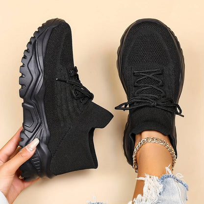 Image showcasing a pair of breathable women's sneakers with a sleek and lightweight design, featuring lace-up closure and a comfortable sole, ideal for casual wear and active lifestyles.