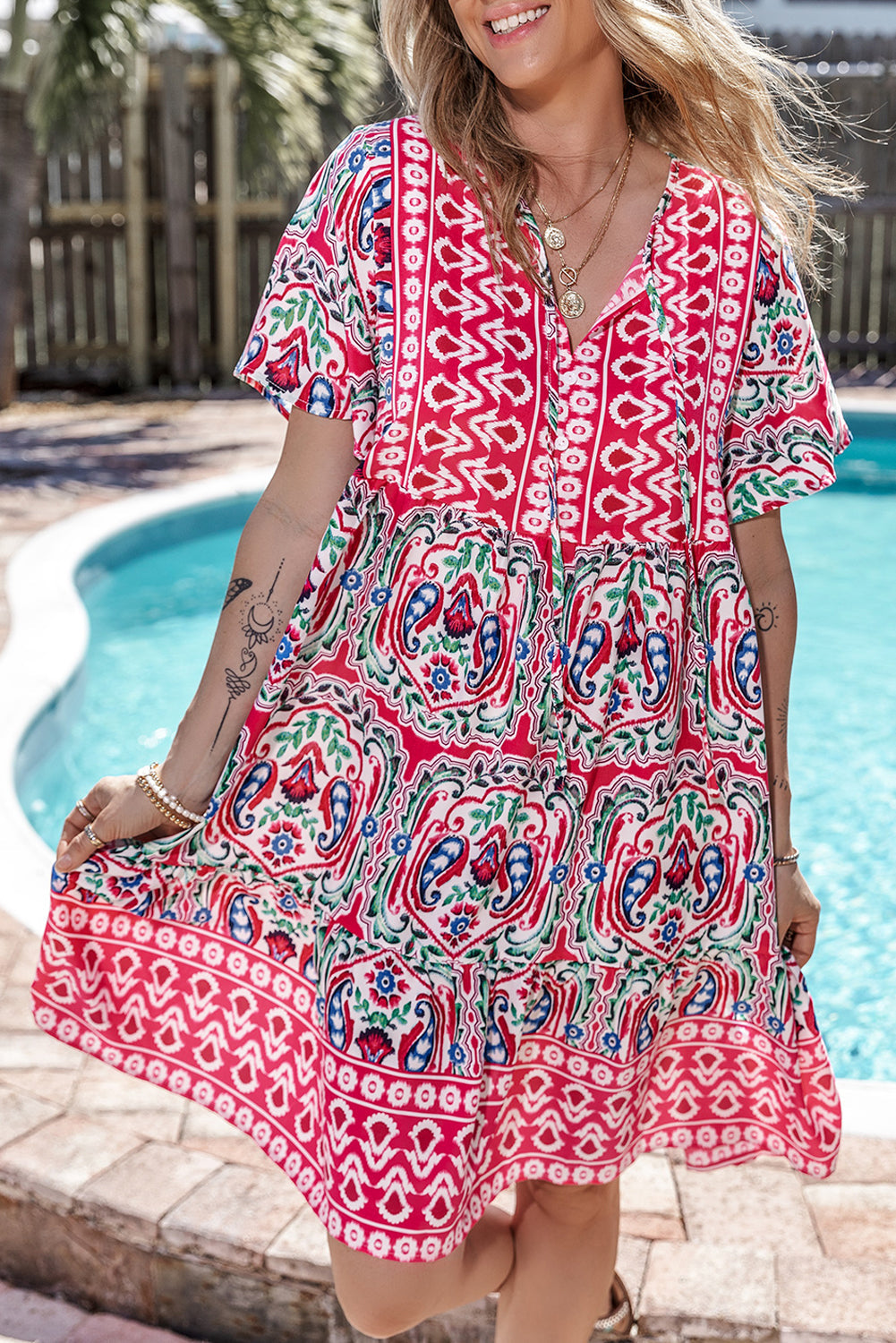 Woman wearing the Mila Women's Vibrant Boho Dress with a relaxed fit, featuring a lively bohemian print and flowy design, ideal for casual and sunny settings.