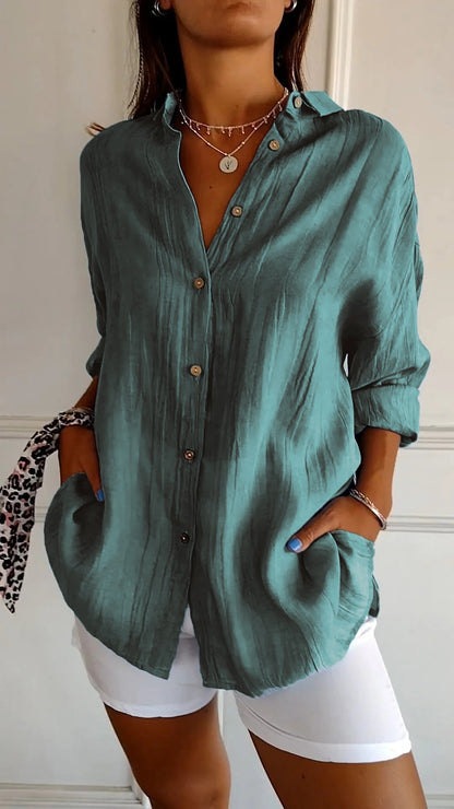 Stylish women's lightweight shirt with a relaxed fit, featuring button details and a casual, versatile design ideal for everyday wear.