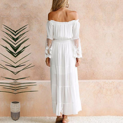 Model wearing the Amelia Women's Off-Shoulder Dress, featuring an elegant off-shoulder design, flowy silhouette, and delicate sleeve detailing, perfect for formal or casual occasions.