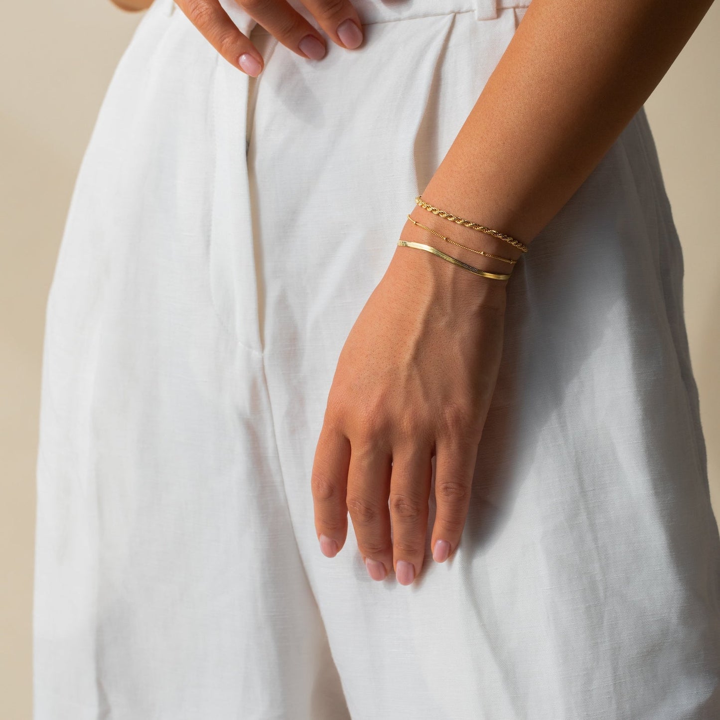 Amma Women's Elegant Bracelet featuring a delicate link design, offering a sleek and refined accessory for everyday wear. This minimalist bracelet adds a subtle touch of sophistication to any outfit.