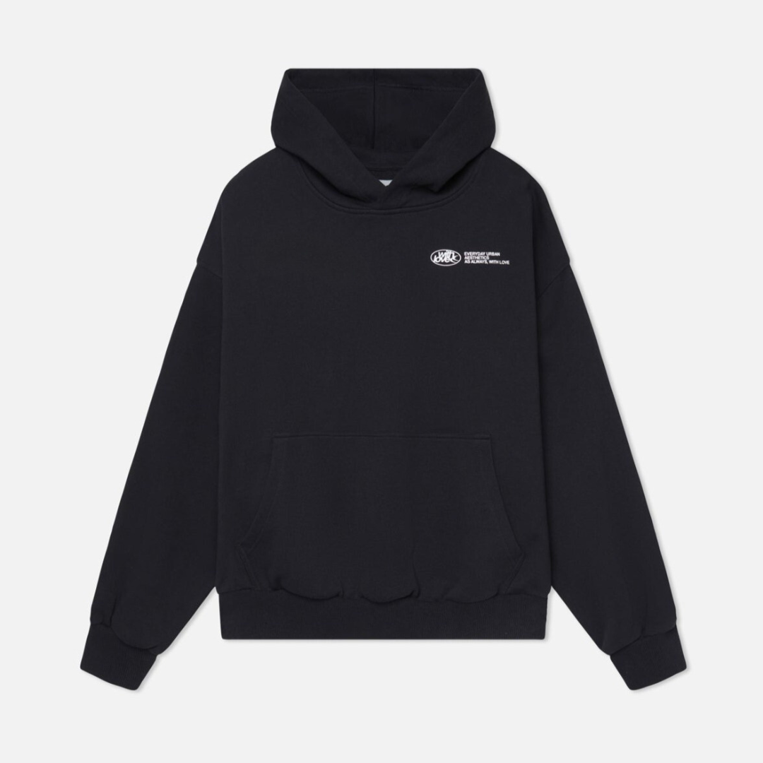 A person wearing the Harper Women's Oversized Hoodie paired with relaxed-fit jeans, showcasing the casual and comfortable style of the hoodie.