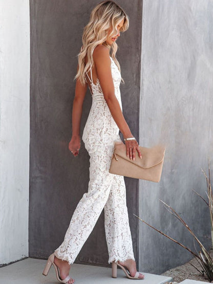 Model wearing the Camila | Lace Spaghetti Strap Jumpsuit, featuring intricate lace detailing, spaghetti straps, and a flattering, tailored fit. This jumpsuit is ideal for formal occasions, offering a chic and elegant look with modern flair.