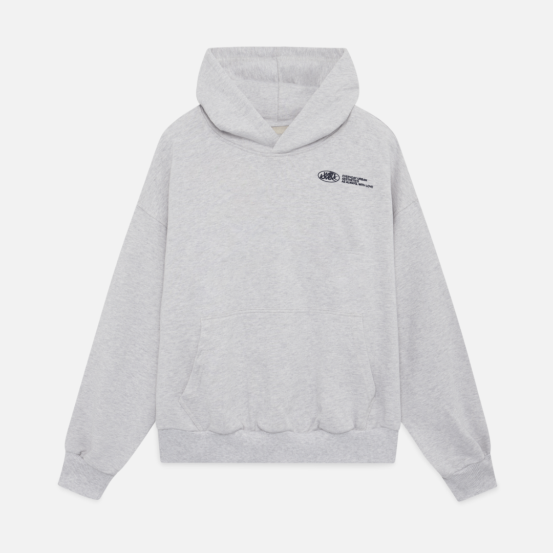A person wearing the Harper Women's Oversized Hoodie paired with relaxed-fit jeans, showcasing the casual and comfortable style of the hoodie.