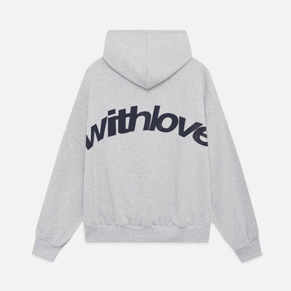 A person wearing the Harper Women's Oversized Hoodie paired with relaxed-fit jeans, showcasing the casual and comfortable style of the hoodie.