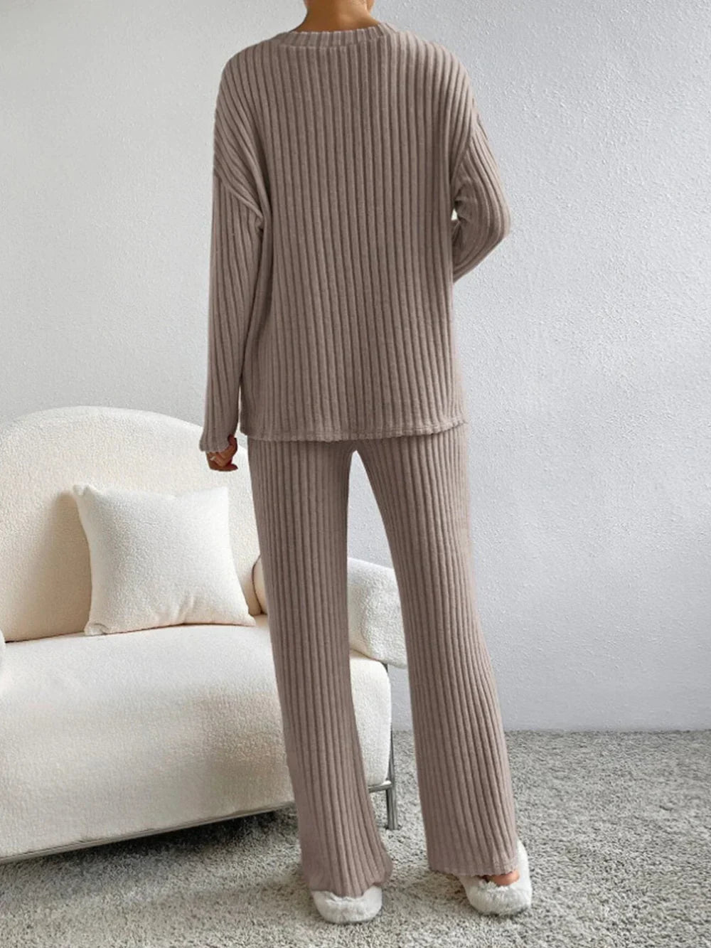 Model wearing the Lila Women's Ribbed Two-Piece Set, featuring a relaxed-fit top and matching pants with a soft ribbed texture, perfect for lounging or casual outings.