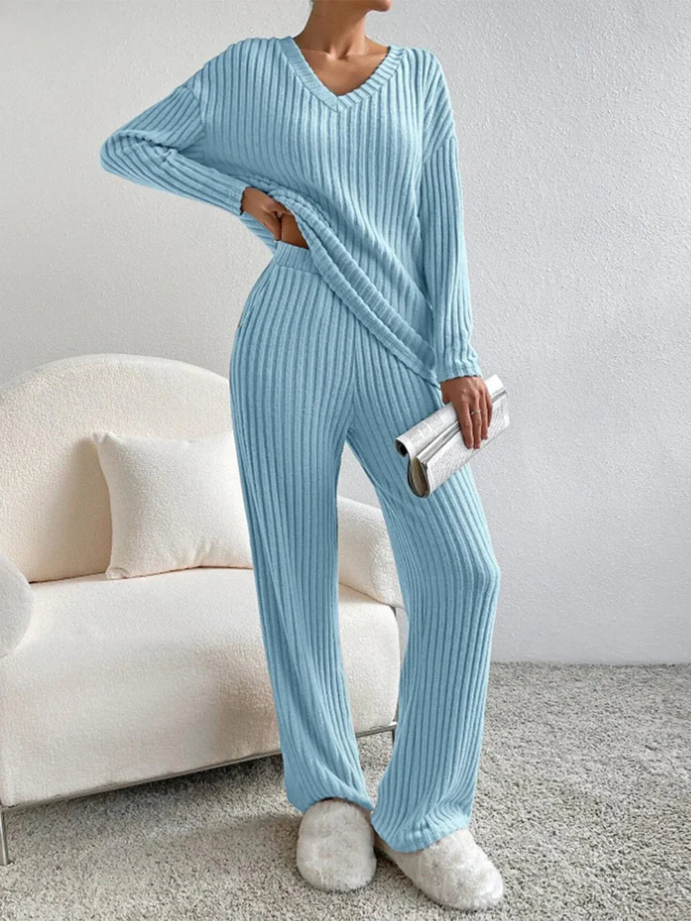 Model wearing the Lila Women's Ribbed Two-Piece Set, featuring a relaxed-fit top and matching pants with a soft ribbed texture, perfect for lounging or casual outings.