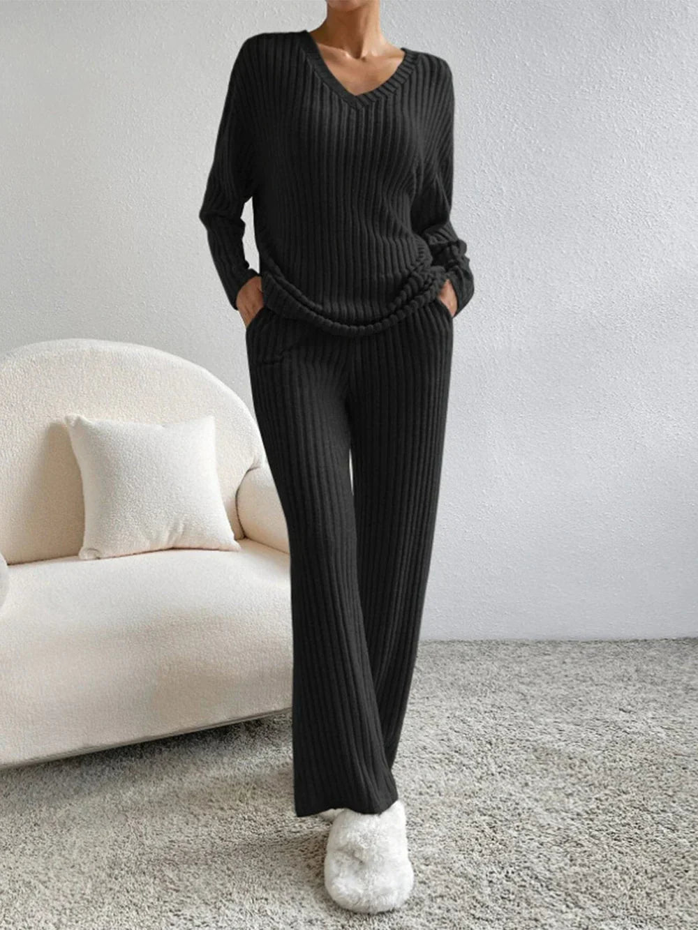 Model wearing the Lila Women's Ribbed Two-Piece Set, featuring a relaxed-fit top and matching pants with a soft ribbed texture, perfect for lounging or casual outings.