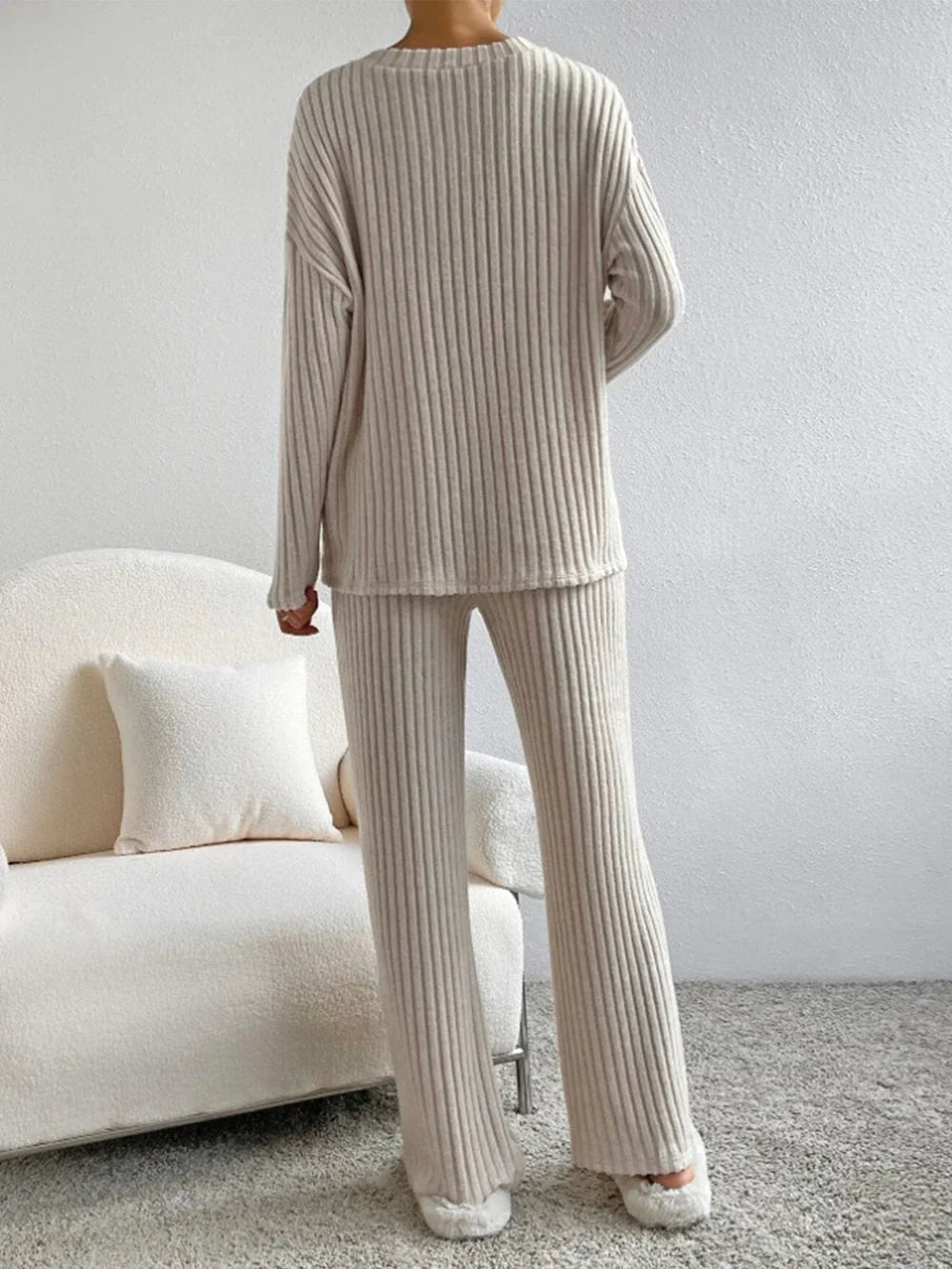 Model wearing the Lila Women's Ribbed Two-Piece Set, featuring a relaxed-fit top and matching pants with a soft ribbed texture, perfect for lounging or casual outings.