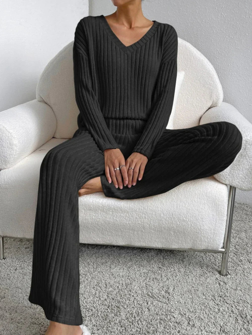 Model wearing the Lila Women's Ribbed Two-Piece Set, featuring a relaxed-fit top and matching pants with a soft ribbed texture, perfect for lounging or casual outings.