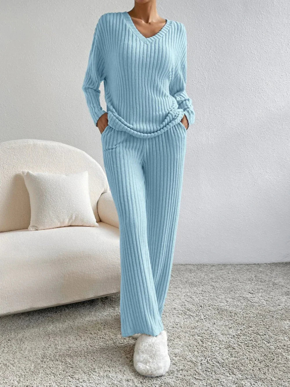 Model wearing the Lila Women's Ribbed Two-Piece Set, featuring a relaxed-fit top and matching pants with a soft ribbed texture, perfect for lounging or casual outings.