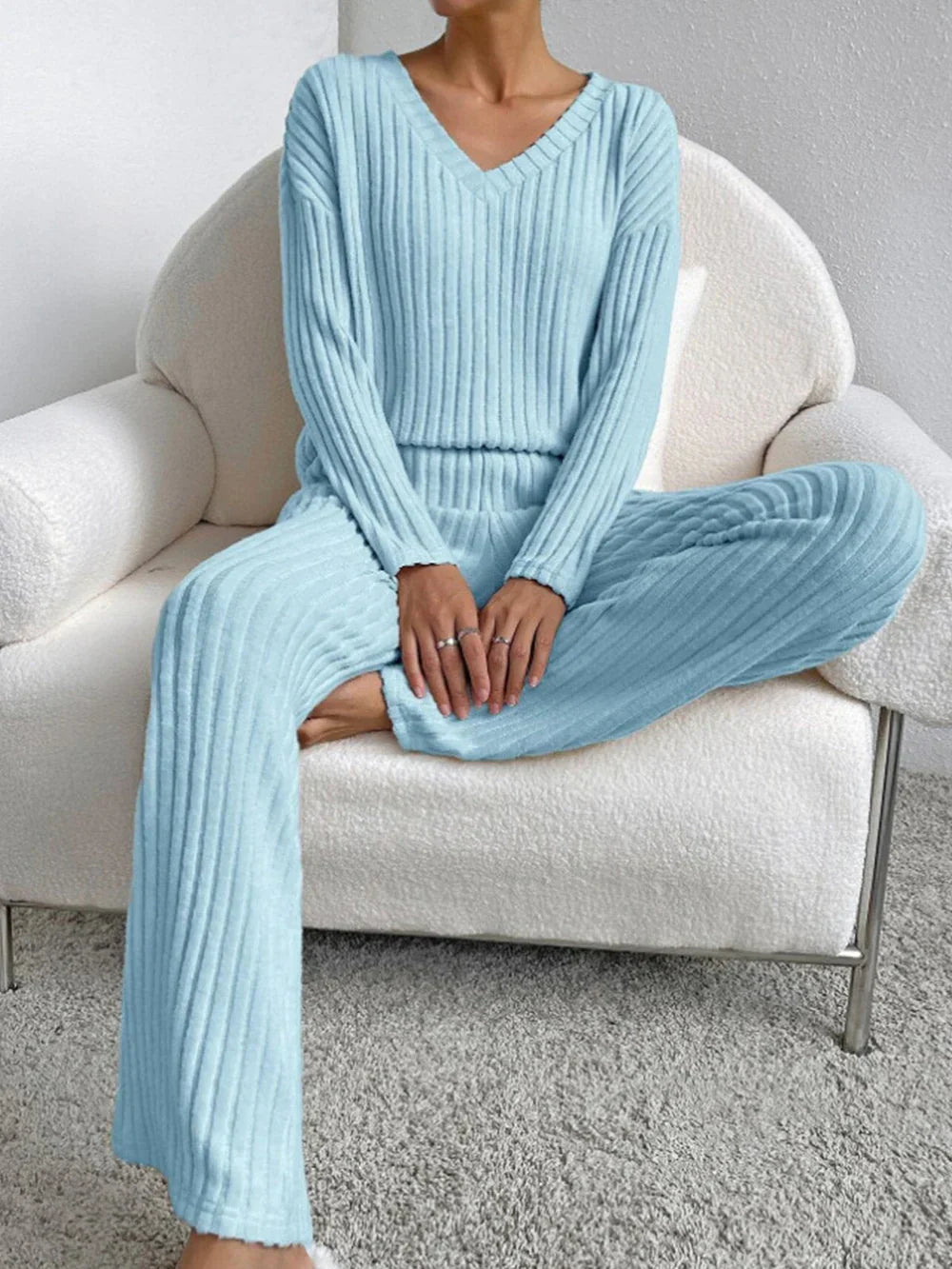 Model wearing the Lila Women's Ribbed Two-Piece Set, featuring a relaxed-fit top and matching pants with a soft ribbed texture, perfect for lounging or casual outings.