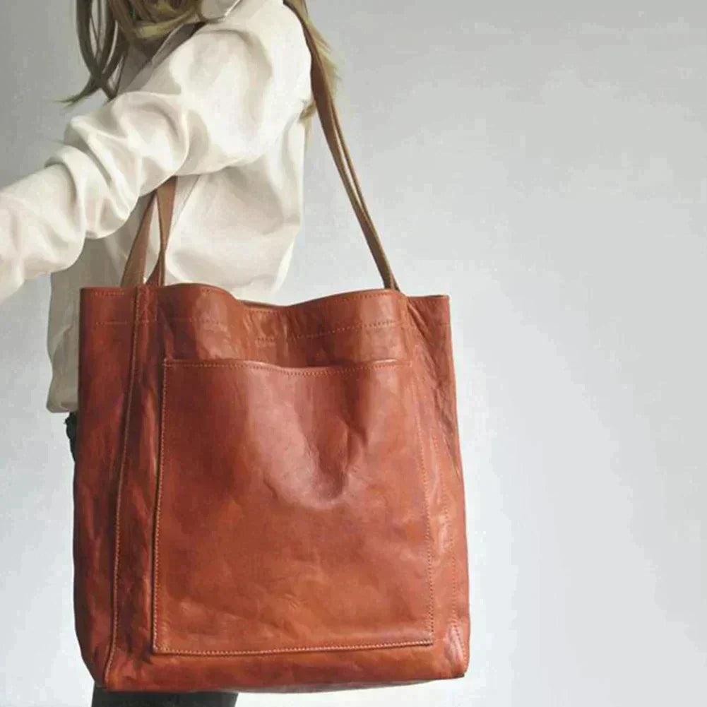 A premium leather handbag featuring a spacious design with sturdy handles, perfect for everyday use or special occasions. Ideal for the Sophia | Women's Stylish Handbag | Premium Leather Handbag.