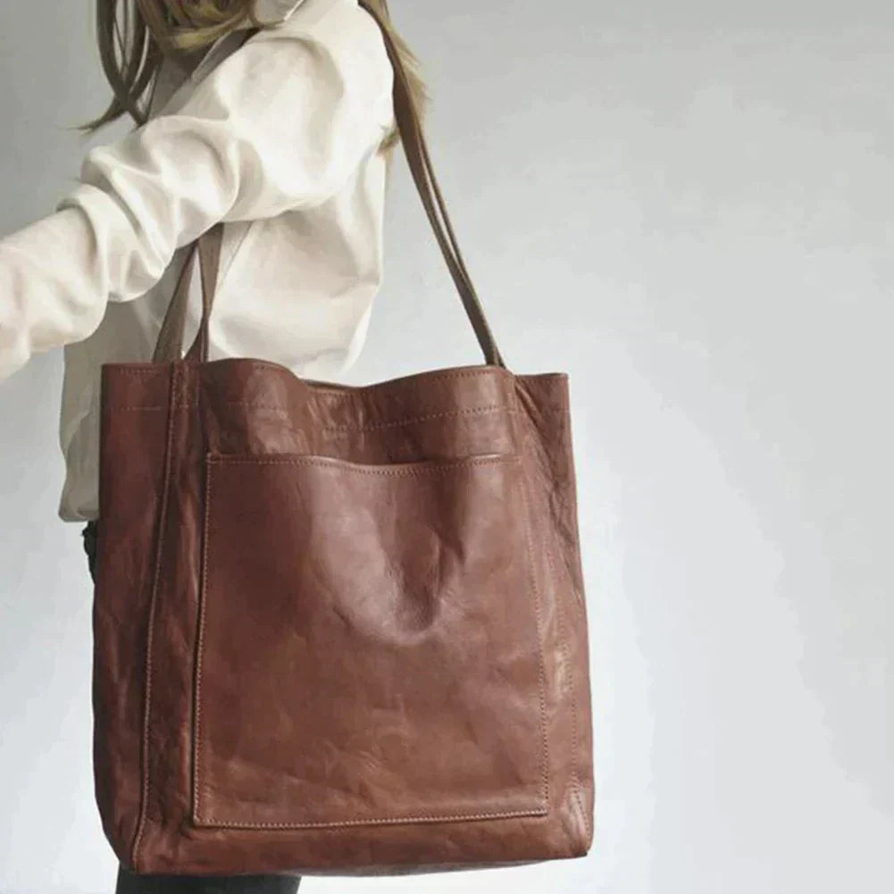 A premium leather handbag featuring a spacious design with sturdy handles, perfect for everyday use or special occasions. Ideal for the Sophia | Women's Stylish Handbag | Premium Leather Handbag.