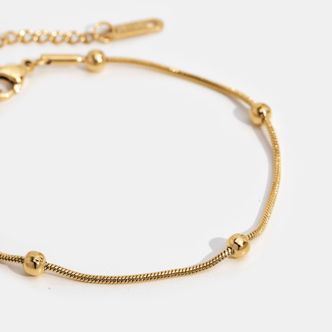 Close-up of the Ava Women's Minimal Bracelet, showcasing its elegant and minimalist design. A sophisticated accessory perfect for adding a subtle touch of style to any outfit.