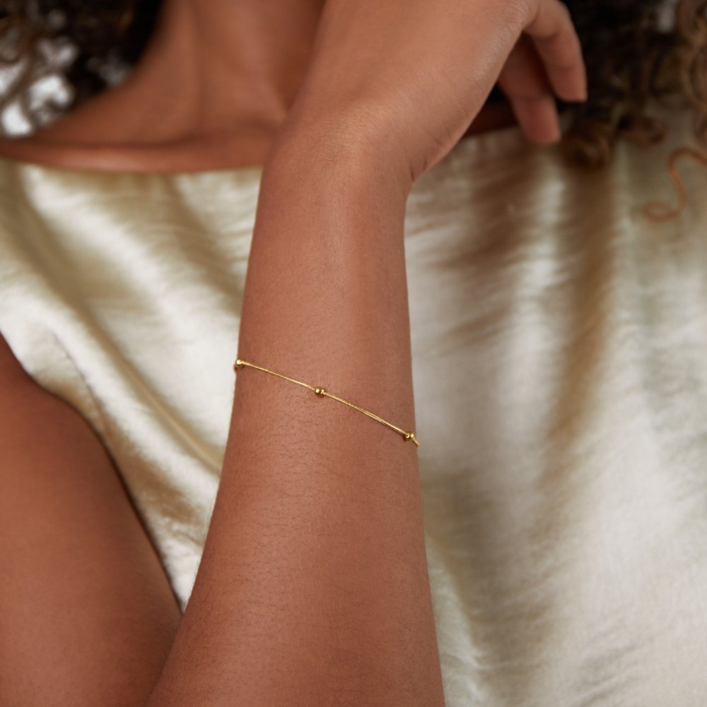 Close-up of the Ava Women's Minimal Bracelet, showcasing its elegant and minimalist design. A sophisticated accessory perfect for adding a subtle touch of style to any outfit.