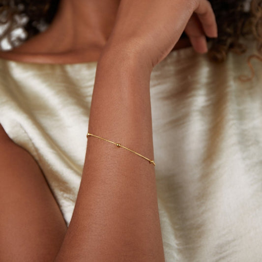Close-up of the Ava Women's Minimal Bracelet, showcasing its elegant and minimalist design. A sophisticated accessory perfect for adding a subtle touch of style to any outfit.