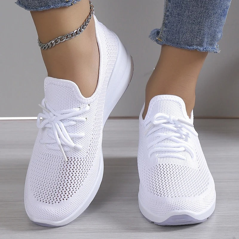 Close-up of a stylish and breathable women's lightweight shoe with a comfortable fit, perfect for casual wear and daily activities.