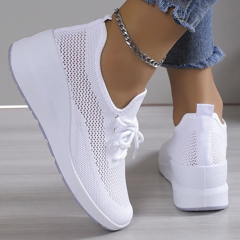 Close-up of a stylish and breathable women's lightweight shoe with a comfortable fit, perfect for casual wear and daily activities.