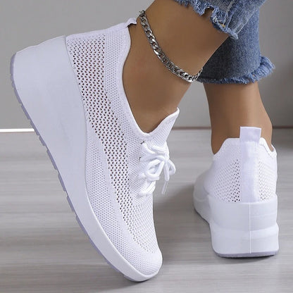 Close-up of a stylish and breathable women's lightweight shoe with a comfortable fit, perfect for casual wear and daily activities.