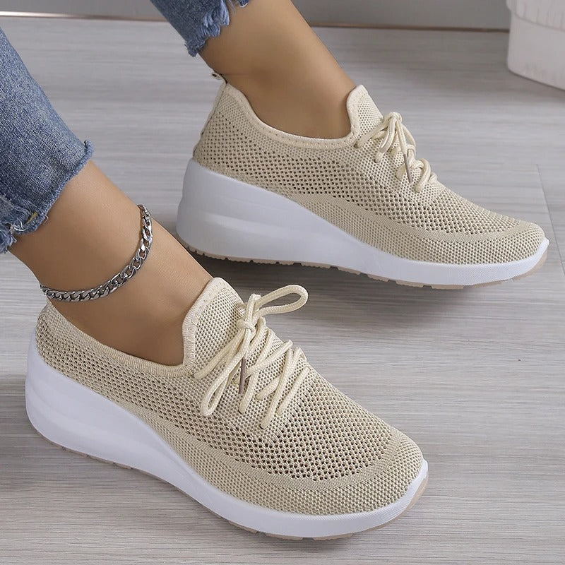 Close-up of a stylish and breathable women's lightweight shoe with a comfortable fit, perfect for casual wear and daily activities.