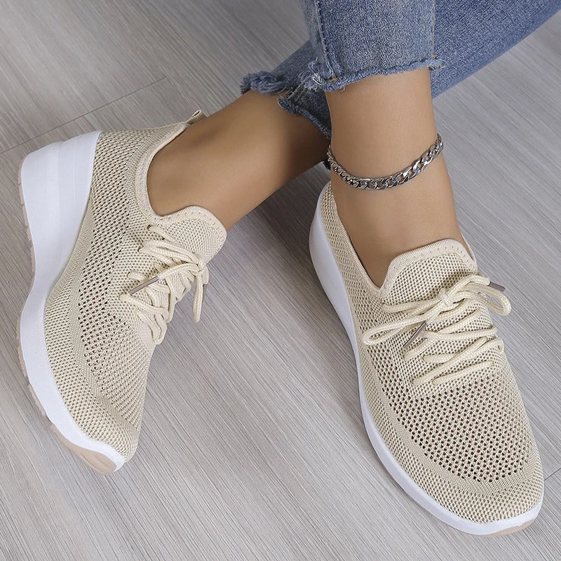 Close-up of a stylish and breathable women's lightweight shoe with a comfortable fit, perfect for casual wear and daily activities.