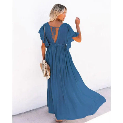 Model wearing the Eva Women's Flowy Maxi Dress with a button-down design, showcasing its elegant and breezy silhouette, perfect for casual and special occasions.