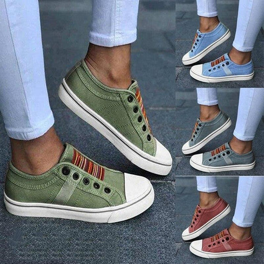 Image showing women's casual sneakers with stylish striped detailing and a classic design, perfect for everyday wear and casual outings.