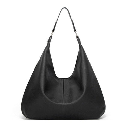 A soft and spacious Sabrina Women's Hobo Bag with a casual, slouchy design and a single shoulder strap. This versatile shoulder bag offers ample space for essentials, making it an ideal accessory for everyday use or casual outings.