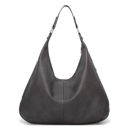 A soft and spacious Sabrina Women's Hobo Bag with a casual, slouchy design and a single shoulder strap. This versatile shoulder bag offers ample space for essentials, making it an ideal accessory for everyday use or casual outings.